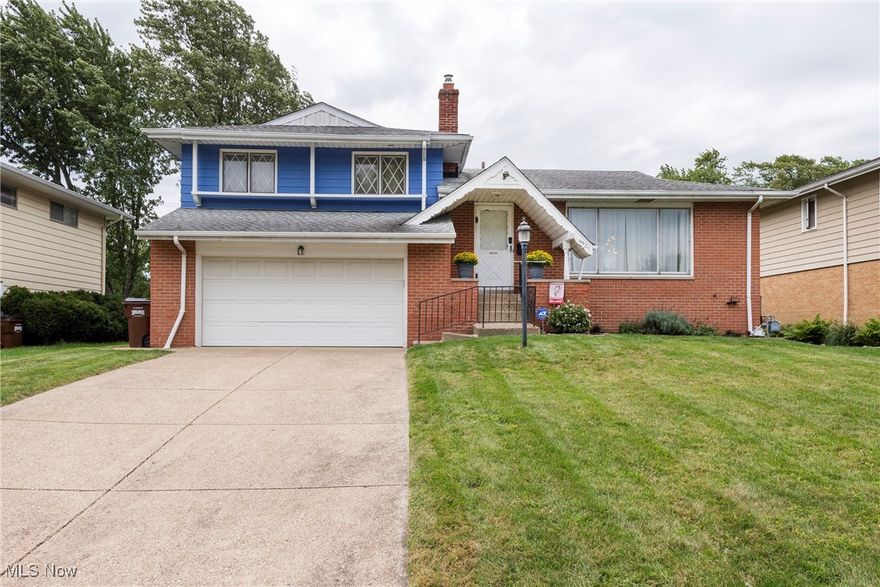 Welcome to 6921 Hollywood Dr in Parma, a lovely split-level home backing to Ridgewood Golf Course. The spacious living and dining rooms feature hardwood floors and abundant natural light, while the kitchen offers a newer floor, all appliances (including a 2023-installed dishwasher), scenic views, and a pantry with a stylish barn door. A half bath is conveniently located on the main level. The inviting family room opens to a patio with a gazebo, installed in 2024, overlooking the fully fenced backyard and serene golf course views--perfect for relaxing or entertaining. Upstairs, you'll find three generously sized bedrooms and a full bath with a newer vanity and mirror. The full basement includes laundry, workspace, storage, and mechanicals and has space for a children's playroom or hobby area. There is Central Air with additional built in unit in dining room for hotter summer months. Enjoy the two-car spacious attached garage in any season. The home's exterior has been recently painted, and you'll be just minutes from the soon-to-open Ridgewood Golf Course Event Center and Clubhouse, which will feature a grill, bar/lounge, indoor and outdoor entertainment areas, golf simulators, and more. Enjoy the convenience of nearby shopping, dining, schools, hospital, MetroParks, and, of course, golf. Don't miss your chance to make this wonderful family home yours!