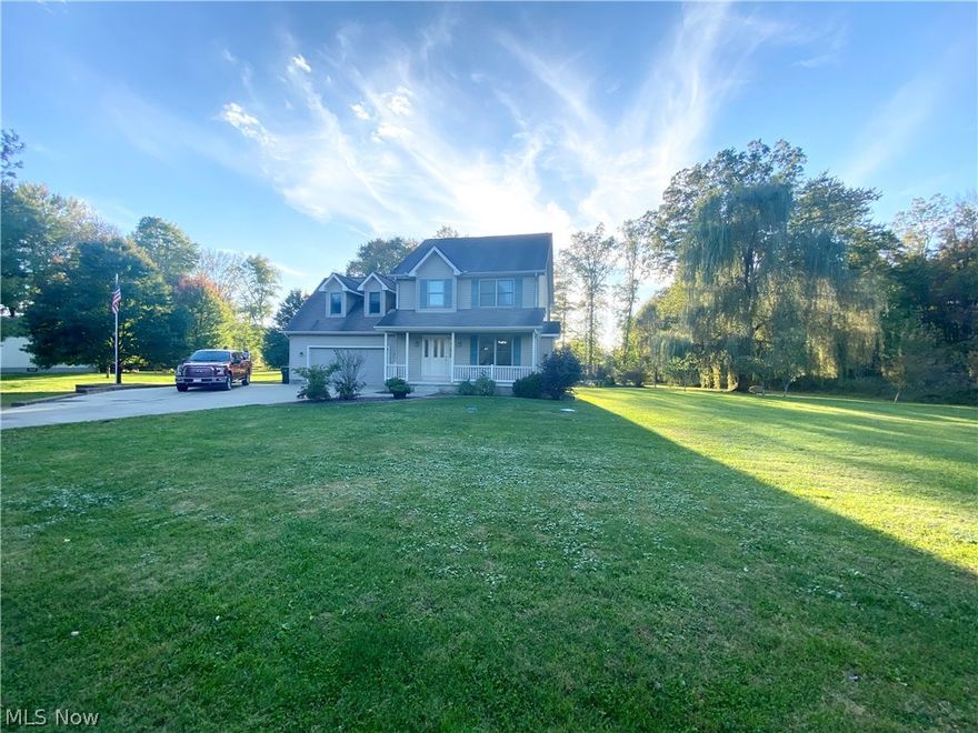 Look no further!  Sitting on over an acre lot in a highly desirable location in Columbiana/East Palestine Schools, this 3 Bedroom, 3 bath home is the Perfect Family Home! Located less than 2 miles to Firestone Farms yet nestled in a serene, park-like setting, this home checks all the boxes! This home offers amazing curb appeal, an above ground pool, Large Deck off the back, 2 Car Attached Garage, EXTRA WIDE and EXTRA LONG Concrete Driveway and more....it even has a small pond on the property. The First Floor hosts a Bright and Cheery Living Room with Gas Fireplace and plenty of windows, a spacious Dining Room with Gorgeous Laminate Wood Flooring, Roomy Kitchen with all appliances, Ceramic Tile Flooring, First Floor Laundry Closet and Half Bath, conveniently located off the Garage Access. Upstairs you will find the Huge Owners Suite with Vaulted Ceilings and Nice Sized  En Suite  Bathroom with Separate Walk In Shower and Stand Alone Soaking tub. Two additional spacious Bedrooms with plenty of closet space, an enormous Bonus Room and an additional Full Bath round out the Second Floor. The lower level is partially finished and is home to a Recreation Room with Beautiful Laminate Wood Flooring, recessed Lighting and Built In Shelves. Downstairs you will also find an Immaculately clean Storage/Work Area. Call today to Schedule your private showing before this Beauty is Gone!