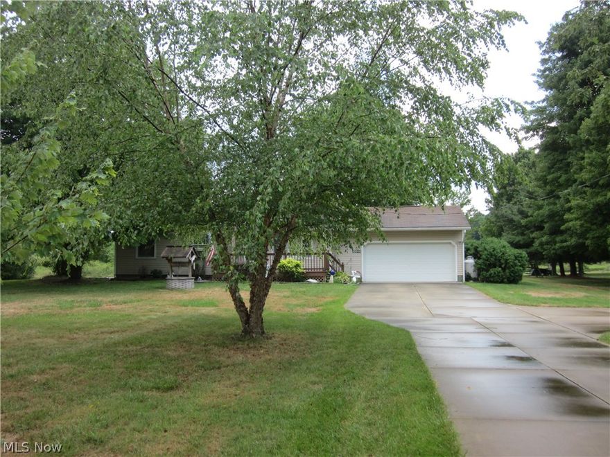 Ranch Home features concrete drive, Front and rear decks, Partially finished basement. Was originally 3 BDR, but now 2 BDR, could be converted back, also finished room in basement could be used as a bedroom , detached garage and nice treed lot.