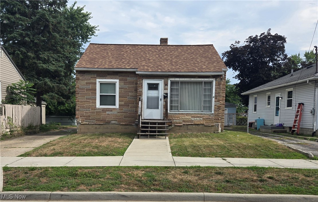 A wonderful ranch in Akron with a fenced in back yard with great highway access. This home has a detached 1.5 car garage with its own electric box. The garage has a metal roof. This home also has a spacious basement with laundry and storage space for all of your things! Located in a neighborhood close to local schools. The roof was redone and the chimney was re grouted in 2020.