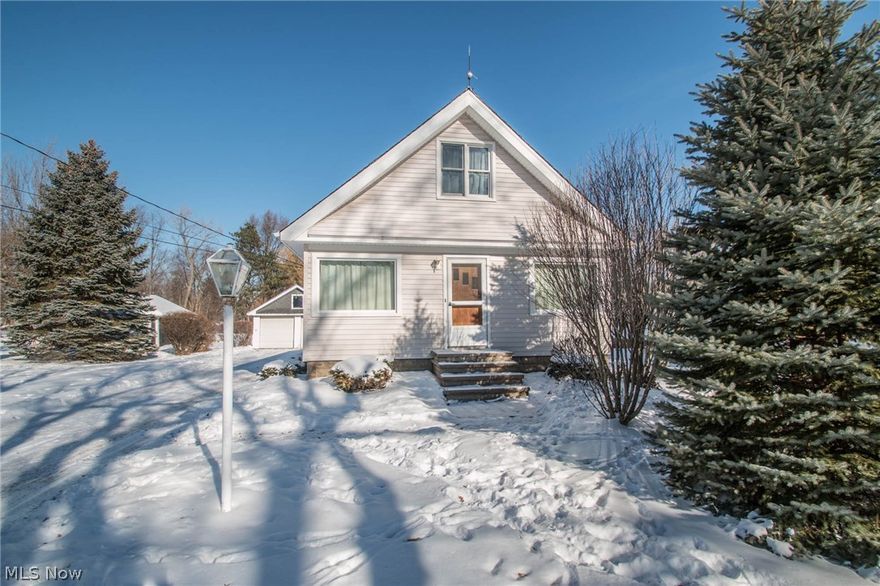 You don't want to miss this 4 bedroom 2 full bath Home in the heart of Seven Hills. This home won't last. The 4 car tandem garage is a car/boat collector or mechanics dream. The private and quiet lot is spacious and peaceful. The kitchen is spacious and offers oak cabinetry and offers an office room, which can also be used as a pantry if desired.  The living room and dinning room are spacious and offers plenty of natural lighting. Water tank is 4 years young. The lower level offers plenty of storage. Call today for a private tour.