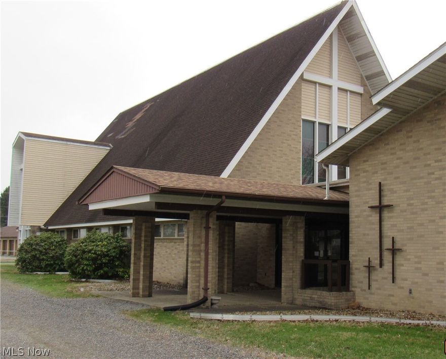 Welcome to Waco Epworth Global Methodist Church — a truly inspiring and versatile property filled with character, beauty, and opportunity.

This stunning brick chapel showcases timeless architecture, highlighted by two large, breathtaking stained-glass windows complemented by additional side windows that line the sanctuary walls, filling the space with natural light and warmth. The solid wooden pews reflect craftsmanship and strength, offering ample seating for worship and gatherings.

Step inside and experience the soaring ceilings with exposed wood beam accents, creating an atmosphere that is both majestic and inviting. The altar area serves as a beautiful focal point, perfect for services, ceremonies, or special events.

The chapel seamlessly connects to an expansive annex building via both front and rear vestibules, offering incredible functionality and flow. The annex provides a wide range of spaces including: Multiple classrooms, Private office areas,
Nursery space, Welcoming greeting room, Multiple restrooms, Fully equipped kitchen, Fully equipped kitchen, Spacious dining hall with a social stage area, Storage rooms and Utility room.

With over 10,000+ square feet of combined space, this property offers endless possibilities for continued ministry, community outreach, event hosting, educational use, or redevelopment.

A detached single-car garage adds additional storage and convenience.

Bright, airy, and welcoming throughout, this remarkable property is ready to serve its next chapter—whether continuing as a place of worship or being reimagined for a new purpose.