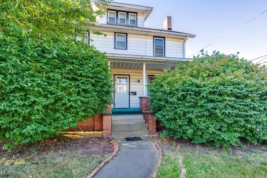 Charming 4-bedroom, 1.5-bath Colonial featuring original hardwood floors, detailed woodwork, and a cozy living room with wood-burning fireplace. Spacious family room off the kitchen, formal dining with tall ceilings, and ample cabinet space with tile backsplash. Upstairs offers four bedrooms with hardwood floors, plus a full bath. Third-floor attic provides extra storage. Enjoy the covered front porch, back patio, and one-car attached garage. Conveniently located near parks, the Hall of Fame, and highways. Recent updates include HWT (2023), updated plumbing, and re-routed drain spouts. Schedule your appointment today!