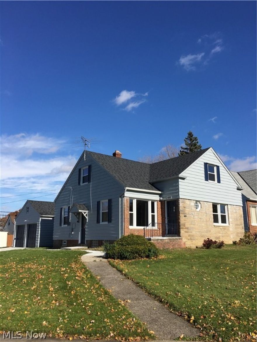 Exceptional one of a kind totally remodeled home w/unique features in this neighborhood. This house will knock your socks off! Quality materials and workmanship. Updated mechanicals throughout. Move right into this light & bright cape cod/master bungalow. Gorgeous huge all new kitchen w/beautiful cabinets, granite countertops, stainless steel appliances, 20 yr. warrantied vinyl flooring. Spacious living room/dining room w/wood floors & charming builtins.  4 good sized bedrooms, 2 on first, 2 on second w/2 beautiful new full baths. 3 season room in rear. Bonus room connecting 2 car attached garage and kitchen. Great recreation room in LL. Fabulous oversized corner lot. New Furnace & AC, new roof, all new windows. All with warranties. Stones throw to great shopping, Whole Foods, University Circle. Don't miss this one!