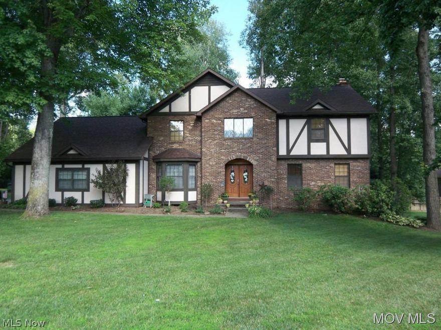 Plenty of room for entertaining family & friends.  Features custom kitchen w/ stainless appliances, granite countertops and beautiful hardwood floors throughout 1st level, kitchen-breakfast area and family room totally remodeled.  Large screened in deck & more.  L-shaped rec room with wet bar & gas log fireplace.  Extra part of rec room is:  16x12.  Home sits on one of the nicest level yards in Greenmont. Park like setting, newly landscaped.  Elem: Greenmont Elementary  Elem/Bus: N  JrHigh: Jackson Jr. High School  JrHigh/Bus: N  High: Parkersburg High  High/Bus: Y  Fire: VOL  Police: CTY  PossFreeGas: N  ;SQFT=Fin L1:1664, Fin L2:1122, Fin Bsmt:915, Fin Above:2786, Fin Total:3701, Unfin Bsmt:200, Unfin Above:200;GAR= 2 Car Att,​​‌​​​​‌​‌​​​‌‌​​​‌‌‌​​‌​​‌‌​​​​ Opener(s)