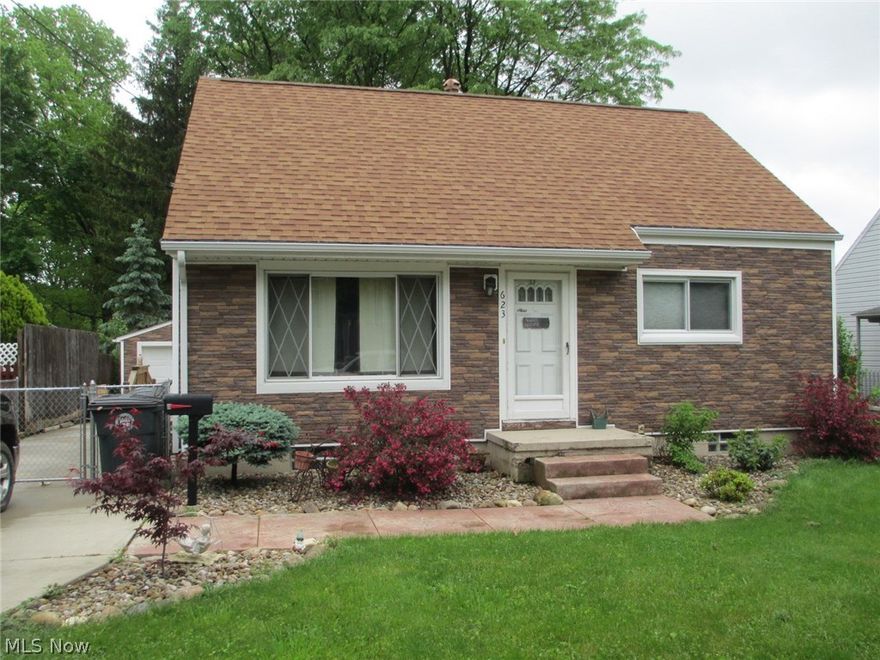 This lovely 2BR Cape is situated in a convenient residential neighborhood with sidewalks. The kitchen flooring, walls, countertop, and sink have been recently updated (2014) The MBR features double closets. Basement has glass block windows, and a large rec room. The 1.5 car garage has electric door opener, and a trellised, covered-patio for relaxing in the private, park-like, fenced-in back yard. If you need more, the walk-up attic is ready for drywall to really utilize your space. Other updates(since 2011) include: Roof, Vinyl Siding,  & Concrete Drive/Patio