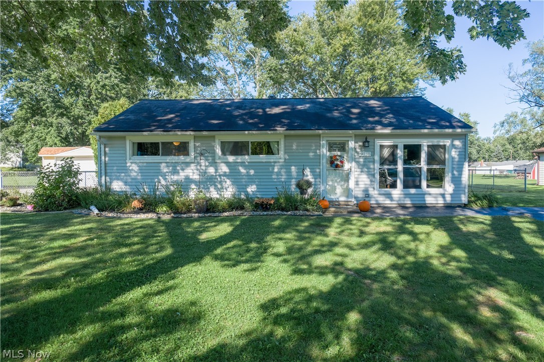 This ranch style home is move-in ready! Conveniently one floor with updates throughout, including new electrical, plumbing, and insulation. Energy saving features include recessed LED lighting throughout the house, tankless water heater, and newer windows. The kitchen features custom cabinets with crown molding and soft closures. The custom tile in the bathroom is a great place to unwind with the luxury depth bathtub and spa showerhead. The large, fenced backyard offers versatility for hosting, gardening, or a quiet evening with friends. Amish built cottage style shed in the yard provides space for all your yard tools. This house is ready to become your home - it just needs you!
