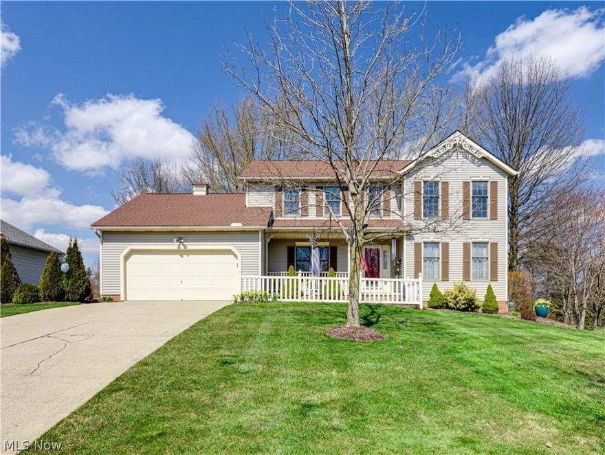 Welcome to this impeccably maintained 4-bedroom, 2.5-bath Colonial home nestled in the highly sought-after Woodhaven development within the Woodridge LSD. Custom built by James Builders this home boasts a blend of classic charm and modern convenience. Step inside to discover a spacious carpeted family room with a charming brick gas fireplace with French doors leading to the inviting living room. Across the foyer, the formal dining room showcases crown molding and is flooded with natural light. The heart of this home lies in the well-appointed eat-in kitchen, complete with stainless steel appliances. Adjacent to the kitchen is a versatile den that could be a 1st-floor bedroom, currently utilized as a home office, providing a quiet retreat for work or relaxation. Retreat to the expansive primary suite featuring vaulted ceilings, a walk-in closet and a full bath featuring a soaking tub and stand-in shower. Three additional spacious bedrooms share a full bath, ensuring comfort and convenience for all. Step outside to your large backyard with a patio, a 10’x14’ shed with electricity, a paved basketball court with lights, and an invisible in-ground dog fence, providing endless possibilities for outdoor enjoyment. The 13-course basement of this home provides many possibilities, featuring a finished recreation room, a workshop/utility room, and a storage/laundry room. Additional upgrades include a new furnace and A/C (2023), leaf guards on the back of the house (2019), and a roof replacement (2017). Complete with a 2-car attached garage, this home combines functionality with style, offering a rare opportunity to own a true gem in a highly sought-after neighborhood. Conveniently located minutes from the Cuyahoga Valley National Park and the Portage Crossing shopping district. Don't miss your chance to make this your forever home!