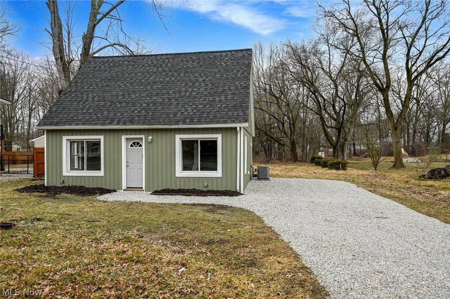 Come see this updated, cute and quaint cape cod home and make it yours! Close to freeway access and within walking distance to Springfield Lake. This home features 3 bedrooms, a new roof, new siding, new furnace and ac unit, new well pump and water softener, new tankless hot water tank, and a fresh new gravel driveway. There is new paint and flooring throughout. The home sits on 0.72 acres and the backyard offers a deck with a partially fenced yard. Or stroll to the back of the property and enjoy the peaceful creek and wildlife. Schedule your showing today! Owner's manager is a licensed real estate agent in the state of Ohio.