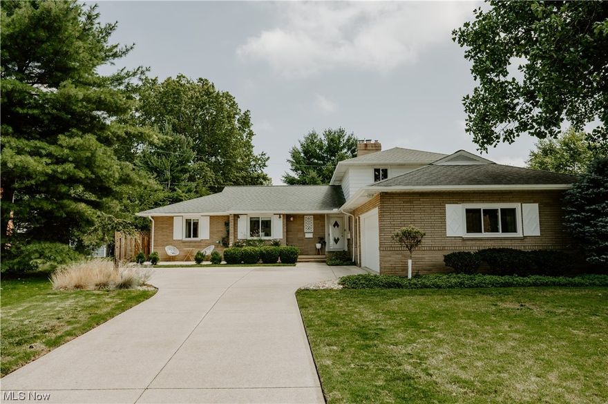 The owners of this home spared no expense bringing modern amenities and a practical layout to the home, while keeping original features and details within the mid- century modern aesthetic. One of the things that makes this home unique is the opportunity for first floor living. Tucked away from the entertaining areas of the home, The first-floor features 3 bedrooms &2 full baths. The second floor boasts 2 additional spacious bedrooms and a full bath. The fully remodeled kitchen features GE Café appliances, beverage fridge, quartz countertops and handmade tile. Just off of the kitchen, you will find the first-floor laundry room and powder room. A bonus room perfect for a home office or playroom completes the first floor. The remodeled owner’s suite is truly a retreat!  Gorgeous white oak double vanity & private water closet, soaking tub and surround shower. The exterior of this home has been thoughtful upgraded; featuring new windows, poured patio, a privacy fence and irrigation system