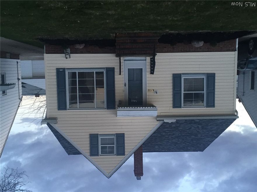 This well maintained 3 bedroom, 2 bath bungalow with a fenced in yard is move in ready! Beautiful hardwood floors, plush carpeting, refreshed main bath and eat in kitchen on the 1st floor are all very inviting.  The upstairs bedroom provides tons of storage, a great place for privacy and relaxation.  The lower basement area provides a spacious rec room area with an electric fireplace and a full bathroom, just need your finishing touches! Huge laundry room on the lower level provides ample hanging and shelving storage.  The lower level includes an area suitable for a computer/home office, and a separate space for a workshop. The outside offers a great backyard for a relaxing after a long day.  The garage offers an extended storage area, making it a 1+ size garage. Brand NEW roof 2015. Seller is including a home warranty. Don't wait call for your private showing today!