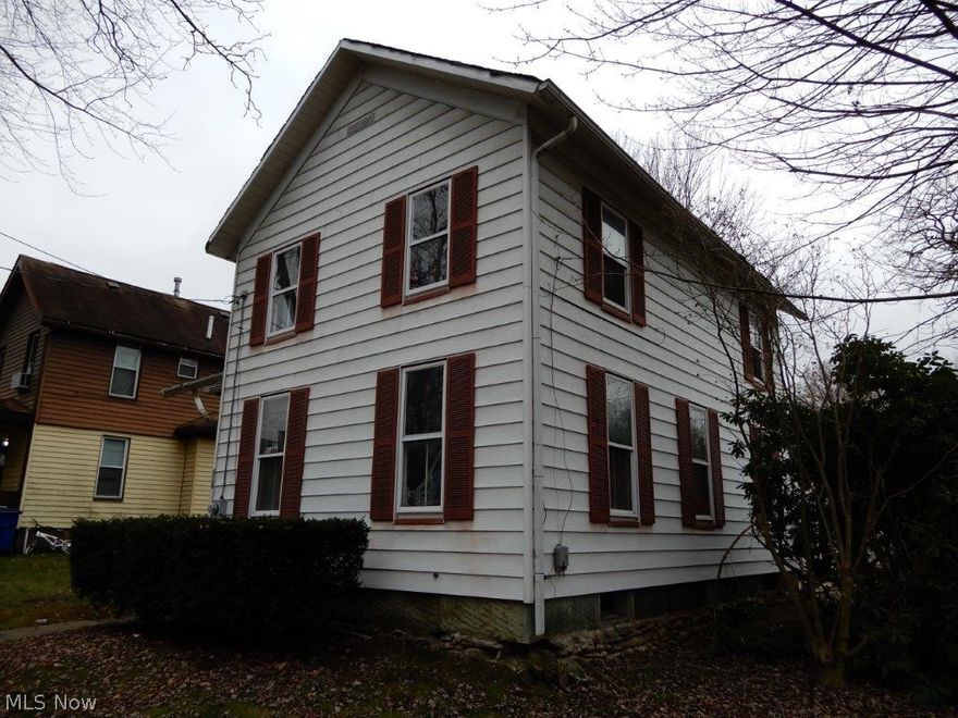 Awesome investment opportunity situated just blocks from the heart of downtown Ravenna! Classic colonial comes equipped with an over-sized 2 car garage, 3 bedrooms, and a full basement, priced to sell!  With some TLC this will make an excellent investment for the savvy investor!!