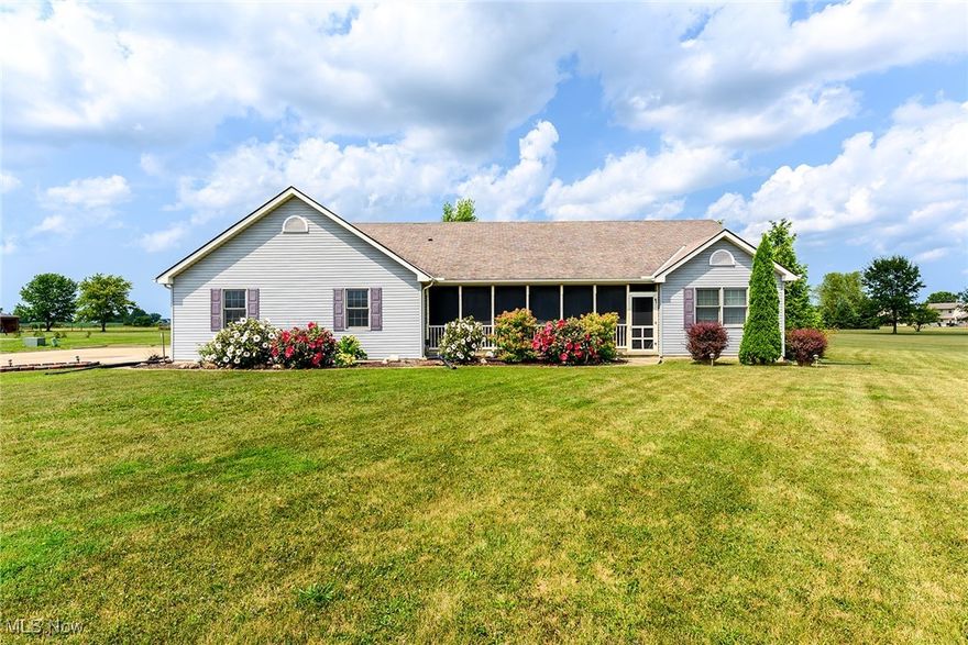 Welcome to your field of dreams home! This charming ranch-style house with over 1,900 sq feet, built in 1999 by Maranatha homes, boasts high ceilings in the great room, spacious rooms and numerous updates, so it's ready for you to move right in. One owner home, all newer appliances stay with the house, and a well-maintained furnace with a brand new motor for the A/C. The kitchen and dining room shine with updated flooring, while newer carpeting flows throughout the rest of the home. Neutral paint colors will make decorating easy!

Situated on a picturesque 2-acre lot of level flat land, this property offers serene views of the Lorain County Municipal Airport. Inside, you'll find three spacious bedrooms and two and a half baths, providing ample space. The convenience of a first-floor laundry room makes everyday chores a breeze and there is so much storage!

The unfinished full basement is a blank canvas, awaiting your personal touch to transform it into the ultimate recreation room, home gym, or additional living space. One of the standout features of this home is the four-season sunporch, which overlooks the expansive backyard. Additionally, the fully screened patio at the front of the house is perfect for relaxing and enjoying the tranquil surroundings.

Is this heaven? No, it’s Elyria! Here, you can enjoy the peaceful rural lifestyle while still being close to all the city amenities and conveniences. Just a short drive away, you'll find Lorain County Recreational Park and Beach, the stunning Cascade Park Waterfalls, and the historic Oberlin College. Plus, you're within easy reach of the CLE airport and downtown Cleveland.

Experience the best of both worlds with a relaxed country lifestyle that doesn’t sacrifice accessibility. This home offers a perfect blend of comfort, convenience, and charm, making it an ideal place to create lasting memories. Don’t miss the opportunity to make this Elyria gem your own!