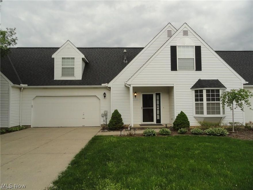 Impressive Cape Cod Condo with great curb appeal  situated in the quite Prescott Green subdivision of Cuyahoga Falls.  One of the largest homes in the community with over 2000 sq. ft. of living and 3 bedrooms / 2.5 baths. Foyer entry ,spacious eat in kitchen with bay window and lovely oak cabinets. The elegant 25x14 living room with gas fireplace is bright and open with windows across the back and sliders to a patio to enjoy the nicely landscaped and  semi private back yard. There's also a formal dining room, 1/2 bath and laundry room with washer and dryer included on the first floor. The second floor has 3 bedrooms and 2 full baths. One is a master bedroom with private bath and double closet. The other 2 bedrooms share a glamour bath with jetted tub and separate shower. 2 car attached garage. Very nice home waiting for you! Won't last long, call today!!!