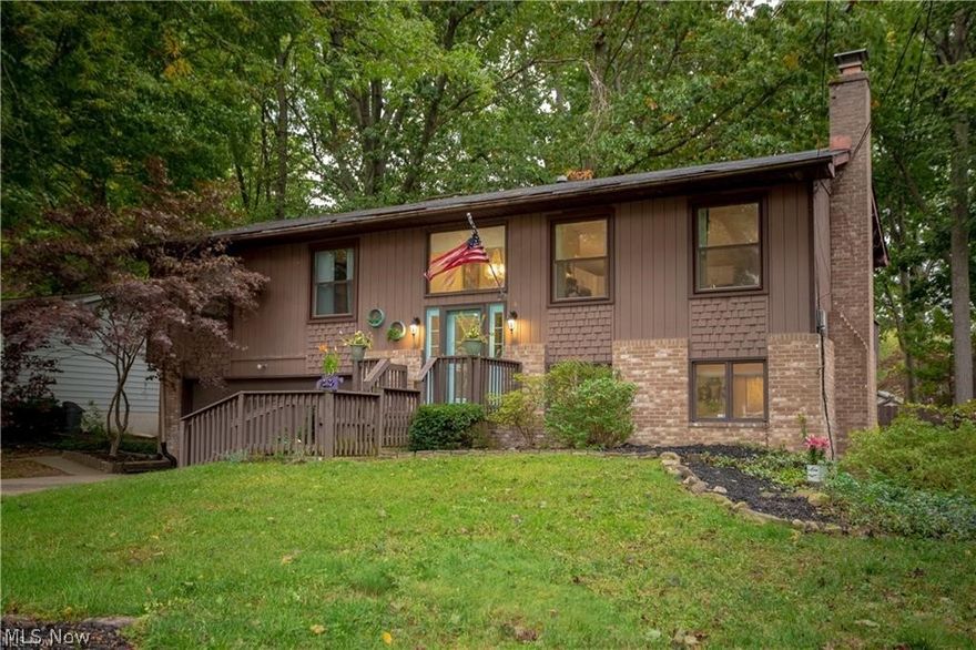 Beautiful fully renovated 4 bedroom 2.5 bath home in desirable Monroe Falls. Walk into a gorgeous brand new open concept kitchen with quartz counter tops, subway tile back splash, new stainless steel appliances, and new wood floors. Also, newly renovated bathrooms, new carpet in the bedrooms. Second family room in lower level with a fireplace and new wood floors throughout. Relax outside on the double back deck that over looks the fenced in backyard and fire pit. New furnace and water tank. Don't miss out, this mid-century modern home won't last long!