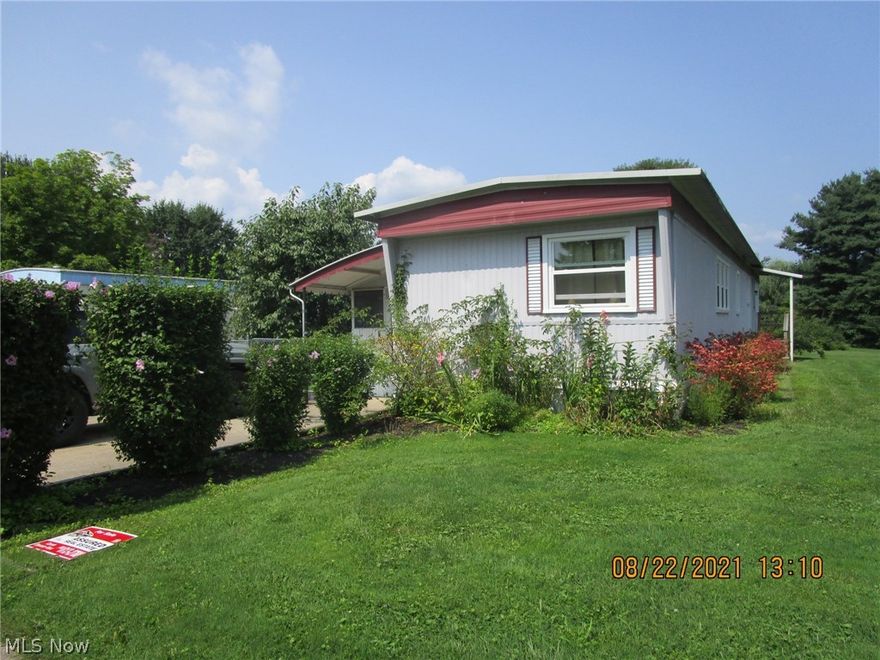 Clean, move-in ready & so well maintained! What an EZ choice if you're ready to down size & enjoy living in a small town! This is a titled mobile home in a nice park. Updates include new skirting in 2018, new windows from 2014-2019 (all double pane, low E), a new metal roof in 2014, new furnace and AC in 2010, new front & back exterior doors in 2018 & 3 new screen doors in 2018, as well! Bathroom is nice sized & features a double vanity, Moen fixtures & a walk in shower. There's plenty of storage & linen space, & a handy hallway location for your washer & dryer, which are included in the sale. The eat in kitchen is clean & sunny, & also offers up a lot of extra storage/shelf space & the kitchen appliances are included, as well. At the front entry, there's some nice space gained in the enclosed 8x24 patio area, w/ a back door out to the 16x9 concrete patio (great spot for your grill!) & the 16x10 shed, which features a loft area, pull through back door, electric & workbench. There's a g