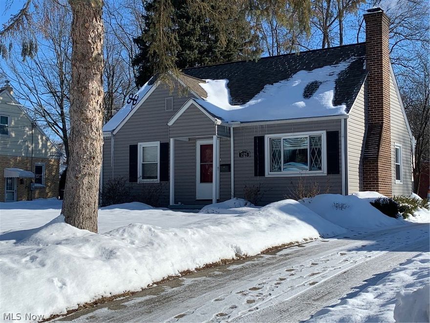 This spacious 3 Bedroom Cape Cod style home has more room than you expect from the street. Enter into the Living Room with fireplace and beautiful hardwood floors. The Dining Room leads to the large Eat-In Kitchen with lots of counter space and storage. There are newer appliances and a pantry. The Family Room looks out to the backyard and opens to the patio. There are 2 first floor bedrooms and an updated Full bath. Upstairs is a large Bedroom, two closets and a study/play area. The full basement has a newer Full Bath, laundry and plenty of room for storage and a play area. Updates include the front walk and steps, the expanded driveway parking pad, front door and windows. (See attached list of updates). There is a storage shed behind the detached garage. The garage has newer electric, lighting, attached workbench and shelves that stay. Washer, dryer and Home Warranty included. Close to shopping, hiking trails, highways and all that Cuyahoga Falls has to offer. Schedule your showing no