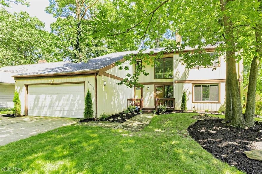 A beautiful, well maintained and updated Cleveland Heights home. Greeted by a bright vaulted ceiling foyer (with hallway access to the first floor half bath and laundry with new washer/dryer 2023) leading to an open floor plan the flows between the family room, kitchen, dining and living rooms. Beautiful, modernized kitchen with all new stainless steel appliances in 2023 including a gas stove, granite countertops, fresh white cabinetry and subway tile backsplash. Generous living space on the first floor with a formal living room complete with a brick, gas fireplace and a family room with beamed ceiling and amazing dual sliding doors that lead out to the deck. The second floor has four generous bedrooms including a primary suite complete with built-in closets and a private full bathroom. Another common full bathroom is off the upstairs hall; all bathrooms are updated with new vanities, fixtures, flooring and a bright fresh pallet. The basement is nicely finished with a great room and bonus room and has been fully waterproofed with new block windows. Great storage room with an additional 400 square feet of space (not included in the square footage total). This home has luxury vinyl plank flooring throughout and has been made efficient with newer windows, new furnace and air conditioner, a new roof and gutter guards, along with a new hot water heater and exhaust chimney liner. Enjoy the outdoors from the spacious deck complete with a gas line for easy grilling and privacy of the full, newly fenced backyard or relax on the front porch and visit with neighbors. Attached two car garage with a new door opener and springs is a nice feature. Conveniently located with easy access to restaurants, retail, local schools/ universities, hospitals and just a short distance from downtown for a quick commute. Seller is offering a home warranty.