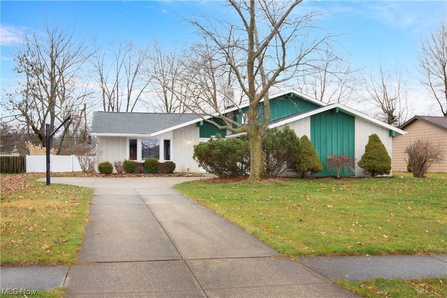 Welcome to a sparkling clean, tastefully updated 3BR, 1.5BA split level home that is inviting in so many vital ways that will enhance your life and pause its hectic pace: a flowing floor plan, costly capital improvements, coveted cul-de-sac location & a quick commute to major expressways as well as Crocker Park, Bradley Woods & the myriad of diverse destinations in North Olmsted. Located at the end of Wedgewood, which is just south off Lorain and about a mile from the N. Ridgeville border, this pampered property relishes plenty of green space & ample street parking for large gatherings. Vaulted ceilings in the Living & Dining Rooms create an aura of expansive, liberating space. The oversized tiled Foyer w/ spacious reception closet and the perfect nook for a bench or table is an inviting, spacious entry to welcome guests - a perfect prelude to the expansive gathering spaces that ensue. Living Room w/ oversized bay window blends with Formal Dining Room which opens to the tastefully updated Kitchen, which includes all appliances, richly hued Corian Counters & beautiful solid wood cabinets with storage galore. The custom built coordinating island is modular and can be configured to your liking. Rear entry off kitchen leads to a concrete patio and expansive rear yard. The Bedroom Suites are located upstairs – a mere 7 steps up - and feature an oversized Full Bath with neutral ceramic tile, comfort height commode, oversized 5’ vanity for your morning rituals and a well sized floor to ceiling closet to keep your “linens n things” in feng-sui style! 5 steps down from the kitchen is a delightful Family Room with WBFP and plenty of windows for natural lighting. A convenient Half Bath+bonus shower stall in the utility room are well maintained. Vigilantly attended mechanicals are located in the large utility room which could be readily modified as a mudroom or office. Full Tear Off Roof '19. Gleaming Stanek Windows. Attached 2-car garage. 1-yr America's Preferred Home Warranty