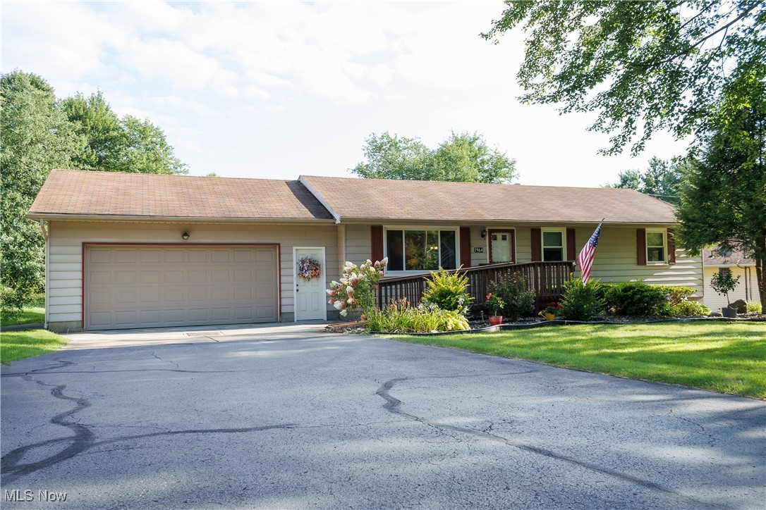 Wanting to move into Brookfield Township but haven't found the right house yet? Come check out 7964 Lincoln St before it's gone! Drive down the freshly paved road to this beautiful ranch home featuring 3 bedrooms and 1 bathroom. In the basement there is a new toilet and shower just waiting for you to finish into your second bathroom. This house boasts new triple pane windows, doors, carpet, garage door, and brand new energy efficient furnace and central air replaced July 2024. Flooring in this home has been redone for your convenience. Some additional updates to the house include an updated bathroom and kitchen with custom oak cabinets! Enjoy your covered screened in deck off the eat in kitchen looking into your large backyard. This house comes wheelchair accessible featuring a composite ramp in the front of the house. For piece of mind the home will come with a one year home warranty! The only thing left to do on this house is move in and begin creating your own memories.