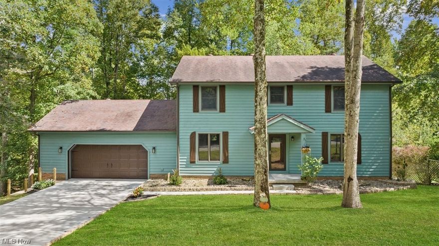 Get settled in just in time to see the leaves changing and gorgeous views from every window! This remodeled 2-story home offers over 4,000 square feet of finished living space and sits on a cul-de-sac! The first floor has an incredible family room with woodburning fireplace, living room, formal dining room, kitchen with stainless appliances and breakfast nook, half bath and laundry. Upstairs you will find 4 large bedrooms with 2 full baths. The lower level offers an office (could be used as a 5th bedroom), huge rec room with fireplace and walks out to a patio within the fenced yard. Enjoy mornings or wind down of an evening on the 16x12 deck overlooking the wooded back yard!