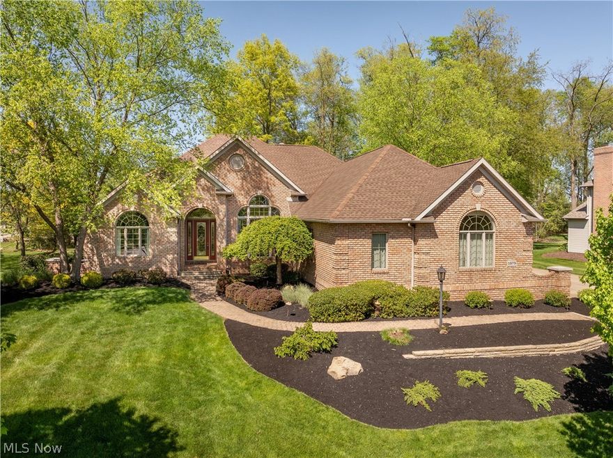 This gorgeous all brick ranch home located in the desirable Monticello development was built by Jamestown.  A Parade Home that won 4 awards has 3 bedrooms, 3.5 baths with multiple upgrades. Spacious eat-in kitchen with Mullett custom cabinetry, new granite countertops, backsplash, and new stainless steel appliances overlooks the private backyard with the Japanese pergola. Access door in kitchen, and owners suite, that leads out to the patio where you can enjoy your morning coffee. Enjoy first floor living at it's finest in this meticulously maintained move in ready home. Numerous upgrades including new roof, new furnace, new air conditioner, new water heater, new Nature Stone in the 3 car garage, owners bedroom shower remodel, plus many more.  A full list of all upgrades is attached as a Supplement. Lower level has approximately 1,000 sf finished for entertaining and possible 4th bedroom with a full bath plus major storage area in the unfinished area as well as a walk-up to the garage. Community has a playground and swimming pool for their residents.