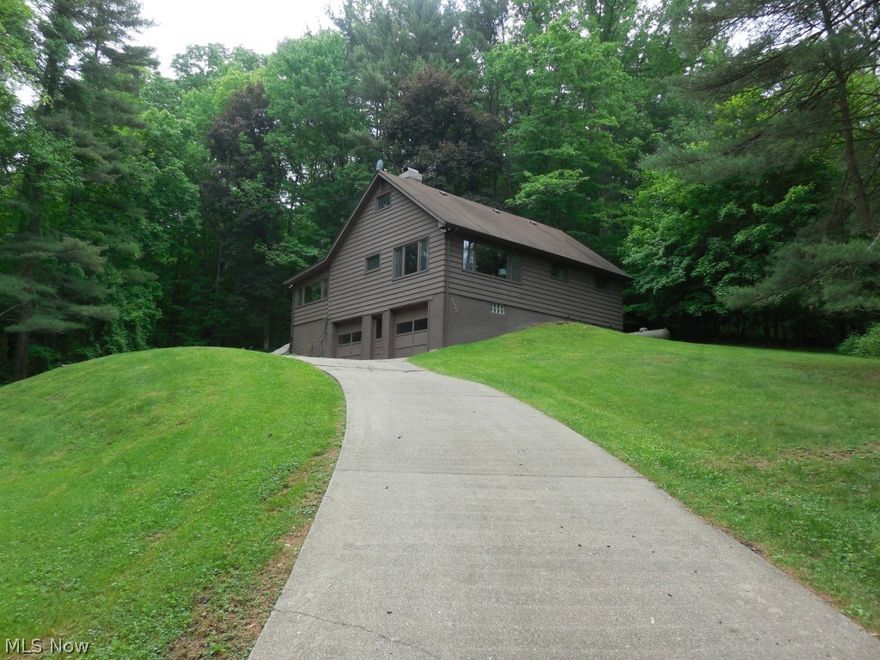 Turn key home at Tappan Lake.  Come enjoy the lake in this quality built 4 bedroom, 3 bath home on a private secluded lot.  This spacious home is fully furnished!  Fireplace in the living room.  Large sun room.  Loft & private entrance with 4th bedroom.  Attached garage.  New dock in 2005 with boat lift.  MWCD Lease for 2014-$1,286.  Parcel#32-0000046.000.  Lot#T-127.  Exclude the pressure washer, trunk on the porch, chair in the living room and 4 wheel drive Polaris in the garage.  Exterior pad with hook-ups perfect for a hot tub.