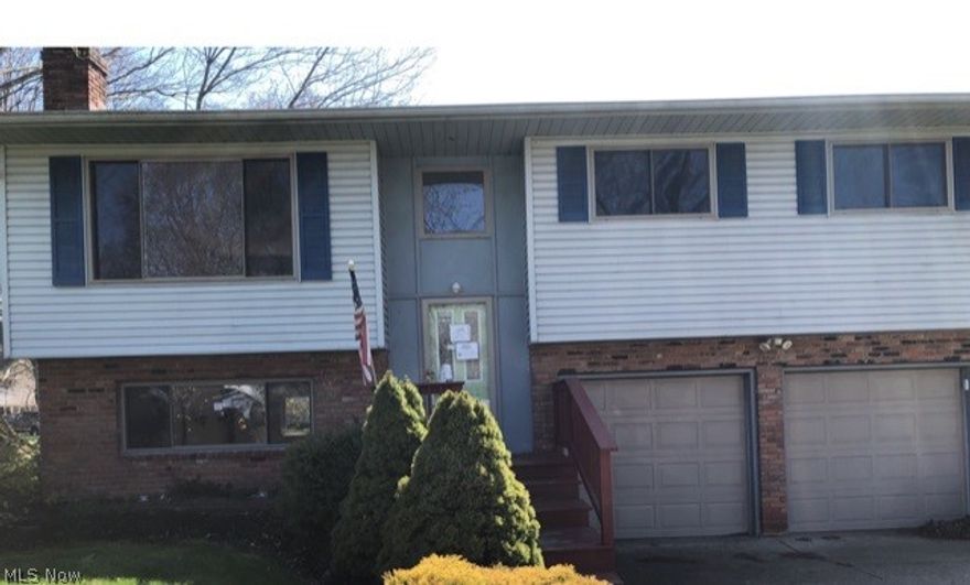 Three bedroom bi-level home,  livingroom, family room. with fireplace in the lower level.  The kitchen  that leads to a dining room and 2 car attached garage.  Half bath in the lower level and corner lot.  Huge yard with shed.