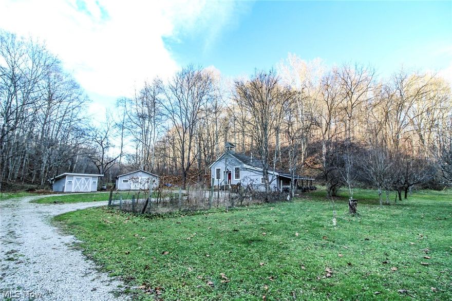 Land for sale in Noble County, Ohio. Don't miss this unique opportunity to own your own hunting camp or weekend retreat! The home can accommodate multiple people and beds. Several outbuildings for plenty of storage for your toys and equipment to maintain the 24-plus acres! A private wooded setting and small creek flows through the property behind home. If the 24 acres is not enough there is several large tracts of Wayne National Forest only a few minutes from this location. Seller does not own the mineral rights and annual taxes are approximately $371.26.