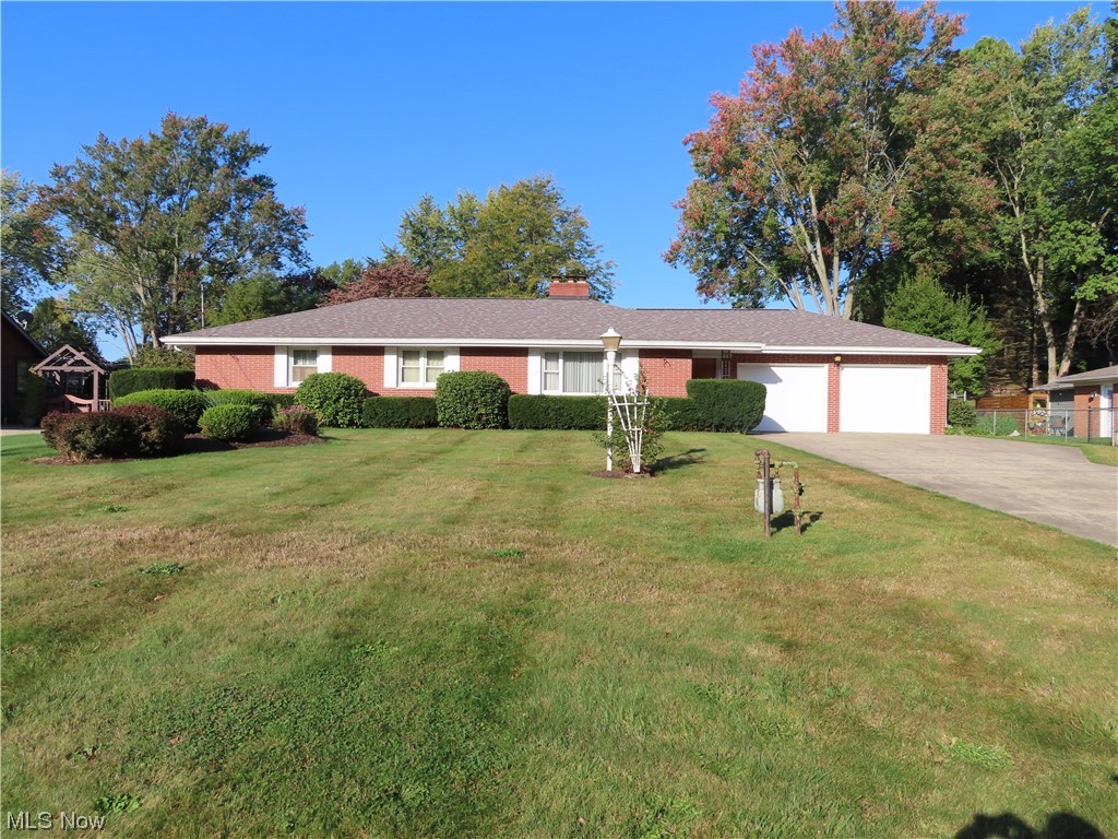 This one owner 1521 sq. ft. all brick ranch situated on .51 acres offers 3 nice sized bedrooms, 1 1/2 baths, living room & family room with wood burning fireplace with sliding glass door to rear patio area, 2 car attached garage (22w X 23deep) with a full 52 X 26 ft. basement. There appears to be hardwood flooring under the bedrooms, hallway and front living rooms which could be exposed. The home additionally offers Generac Gas RTS Generator, Kinetico water softener system, 2002 Bryant furnace, large shed( 18 X 14 ) in rear yard with electric. The first level bath and a half could be reconfigured to 2 full baths if desired.
Though the kitchen with breakfast bar is slightly dated, it does offer great hardwood cabinets, wall oven, counter top stove and excellent views to rear yard and family room.
Rear yard offers chain link fencing with gate access from both sides of property. Perfect for children to play or pets to roam.
An Old Republic Home Warranty is included in the sale of the home.
The home has had wonderful care and numerous mechanical updates (newer windows, roof, H20 heater, furnace & more) throughout it's history.
This house is move-in condition however, you could bring your own decorating ideas to paint the walls, refinish hardwood flooring, update the kitchen & baths (if desired) and call this solid brick house your home in a very secluded Green School District neighborhood.