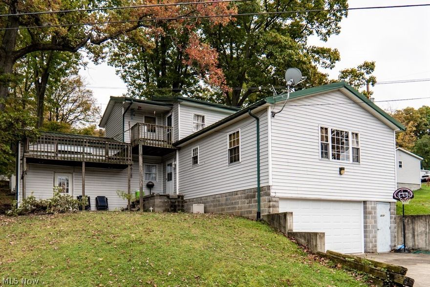 Easy living in this Guilford Lake home with lake views.  The location is within seconds of the lake.  This open floor plan offers vaulted ceiling and beautiful sunlight  from the many windows all day long. The great room is truly just that with a spacious living room area, dining area and large kitchen.  This floor also offers 2 bedrooms, laundry and full bath.  A side door opens to a covered patio area.   The Master Bedroom of considerable size is on the 2nd floor with a full bath and doorway to a deck overlooking the water. Over sized storage area and attached 2 car garage completes this home.  Perfect for full time living or as a summer get-a-way!  Come to enjoy all the amenities that Guilford Lake State Park has to offer.   Call to schedule your private showing today