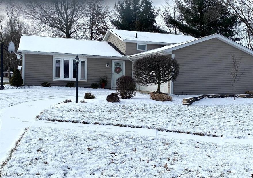 Welcome to this adorable 3 bedroom split level on a Cul-de-sac Lot. Large Living room and Formal Dining room. Kitchen with Stainless steel appliances. Walkout to your 3 season sun room, newer carpeting and screens. View of the woods. Family room with wood burning fireplace. Large laundry room, plenty of room for storage. 3 bedrooms, 2 updated baths with granite counter tops. 2 car garage with pull down stairs (flooring for extra storage) The Hot Tub stays! Roof from 2022, Furnace, A/C & Hot water heater from 2015. Move in Condition! Don't miss this beauty! Submit all offers in 1 PDF file. Please.