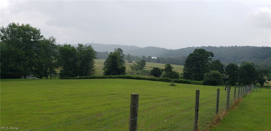 New Survey complete.  2.4 acres +/-  Water and electric on site.  This is a great building site with access from front and rear of the property.