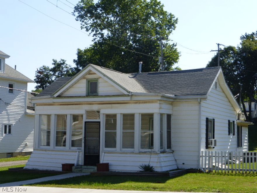 If you're looking for a great income property or an affordable home, don't miss seeing this cute one story home offering a large backyard, updated roof, aluminum siding, convenient location and low price w/payments lower than rent.  Tenant occupied. 24 hour notice for showings. Owner my leave washer & dryer but doesn't guarantee working condition.