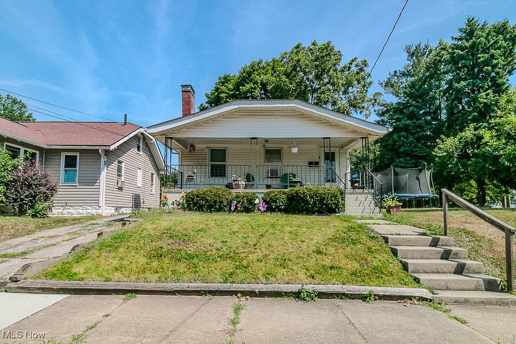 Investor friendly opportunity in easy to rent East Akron! This tenant occupied 2 bedroom, 1 bath home is currently leased. Inside, you’ll find a large living room with a gas fireplace, a dining room with built-ins, and a functional kitchen. The finished basement adds value with a wet bar and bonus space for storage or recreation. A covered front porch, rear deck, detached garage, and off street parking in the driveway round out the exterior. Conveniently located near shopping, schools, and public transit, this is a solid addition to any rental portfolio.