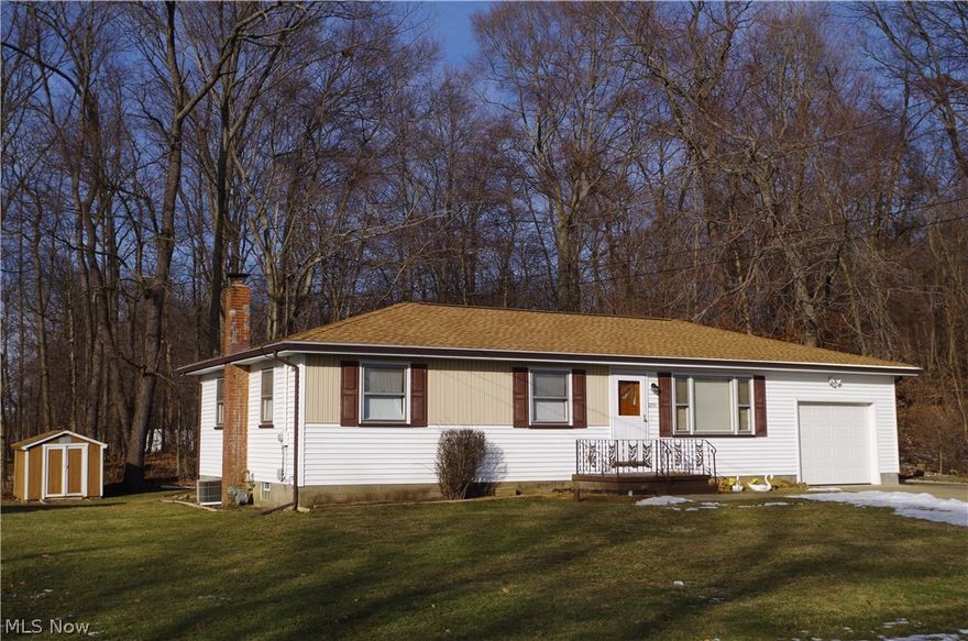 One owner solid home with major mechanical updates! Sitting on a large wooded lot the newer vinyl siding and roof gives this classic ranch great curb appeal. Once inside you will love the spacious living room and open eat in kitchen. The kitchen is nice and bright with plenty of maple cabinets and neutral countertop. The three bedrooms are good size and offer ample closets. There is a half bath off the master bedroom and hardwood floors under carpeted areas on the main floor. The lower level offers one additional bedroom, full bath and great additional living space just waiting for your finishing touches! Updates include roof/vyn siding, boiler, A/C, well pump and bladder, h2o tank, glass block windows, 100 amp electrical service and garage door, the list goes on. There is so much to like here and it is absolute move in! Good location, Convenient to shopping, parks and more. Call to see this home today!