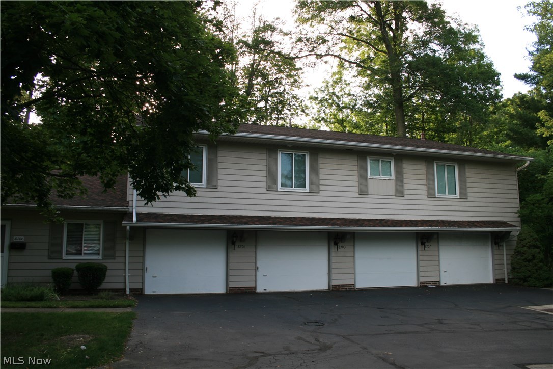 Great location in Brecksville close to freeways, shopping, restaurants and the wonderful park system. Wooded quiet location near I-77 and I-82. Two bedroom townhouse style with one car heated garage with keyless entry, laundry. Living room opens out to a private patio area to enjoy. Dining room area and galley kitchen with lots of cabinets and a pantry. Pass thru/breakfast bar area. All appliances included. Furnace and a/c 2010. Main bathroom redone with granite countertops and freshly painted. 1/2 bath on main level. One Year Buyer Home Warranty.
