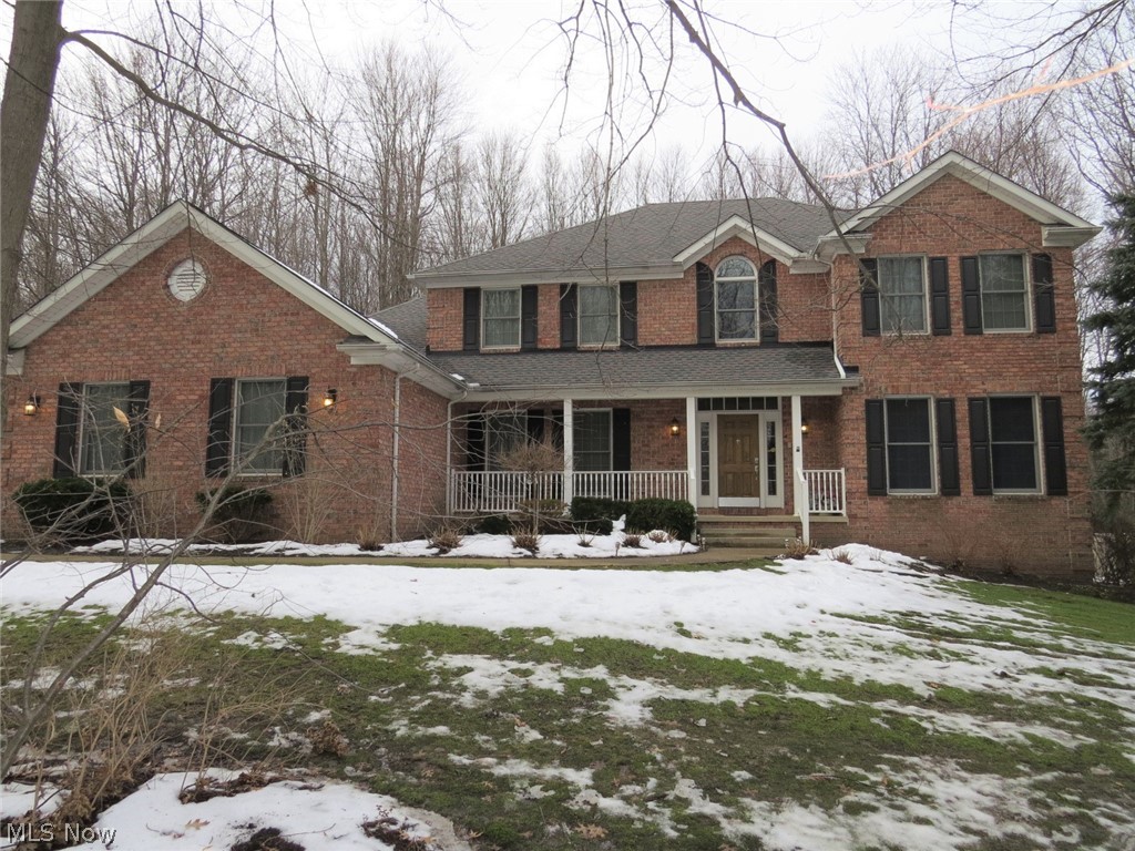 Move Right In To This Fabulous Colonial Nestled On A Wooded Lot! From The Moment You Pull In The Drive There Is So Much To Love In This Brick Home With Large Driveway, 3 Car Garage, Front Porch & Beautiful Wooded Lot. Upon Entering This Home The Curved Staircase & 2 Story Foyer Welcomes You In. French Doors Lead To The Office With A Desk For 2 & Built-In Cabinets. This Home Also Features A Spacious Formal Living & Dining Room, Updated Gourmet Kitchen With Cambria Counters, Stainless Steel Appliances & Island, Dinette, & Coffered Wood Ceiling In Fireplaced Great Room. Upstairs You Will Enjoy The Master Bedroom With Hardwood Floors, Master Bath With Double Closets, Ceramic Floors, Jetted Tub, Double Stainless Steel Sinks & Tiled Shower And 3 Additional Bedrooms. The Walk Out Basement Has Multiple Rooms Including A Recreation Room With Bar & Fireplace, Bonus Room For The Pool Table, Family Or Media Room With A Gas Fireplace, Full Bathroom & An Unfinished Space For A Workshop. This House