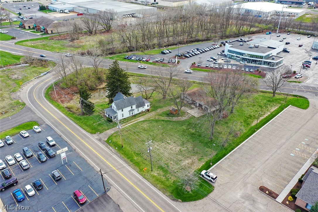 Light Industrial Land - Selling In 2 Parcels - Jackson Twp. – High-Traffic Exposure – Public Utilities - On-Site & Online Bidding Available - ABSOLUTE AUCTION, all sells to the highest bidder. ONLINE BIDDING BEGINS SUNDAY – MAY 22, 2022 – 12:00 PM and AUCTION LIVE ON-SITE BIDDING WILL BEGIN TUESDAY – MAY 24, 2022 – 1:00 PM. AUCTION #1: Parcels #1615052 and #1619793 contain 2.04 acres with public utilities available. Improvements include a 1,720 SF farmhouse with 3 bedrooms, a full bath, gas FA furnace, and updated breaker electric. 24’ x 28’ and 24’ x 32’ garages with cement floors. Real estate taxes are $1,239 per half-year. House is currently serviced by well water and septic system. The property has 409’ frontage on Whipple and 453’ frontage on Wise. NOTE: Property is zoned I-1, Light Industrial. Check zoning for your particular needs. The property will be open for viewing on auction day starting at 11:30 AM. Nice, easy access to I-77, the Strip, and Belden Village. TERMS ON REAL ES