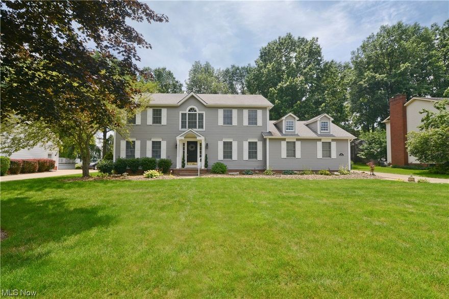 Welcome Home to this beauty in Canfield!! The kitchen is equipped w/stainless steel appliances, granite countertops, backsplash, pantry, and large island. The 1st floor also features the laundry room, guest bathroom and a beautiful dining room w/hardwood floors and the living room/play room has beautiful crown molding with a brick gas fireplace. The primary bedroom on the second floor features vaulted ceilings, primary bathroom with soaking tub and shower and a walk in closet. The other 3 bedrooms all feature large closets for extra storage. Enjoy a movie night in the basement with the projector and media chairs. Outside you will find a large backyard that is fully fenced in featuring a large deck, above ground swimming pool, large shed and play area. Don't miss out on this one, call me for your private showings!!