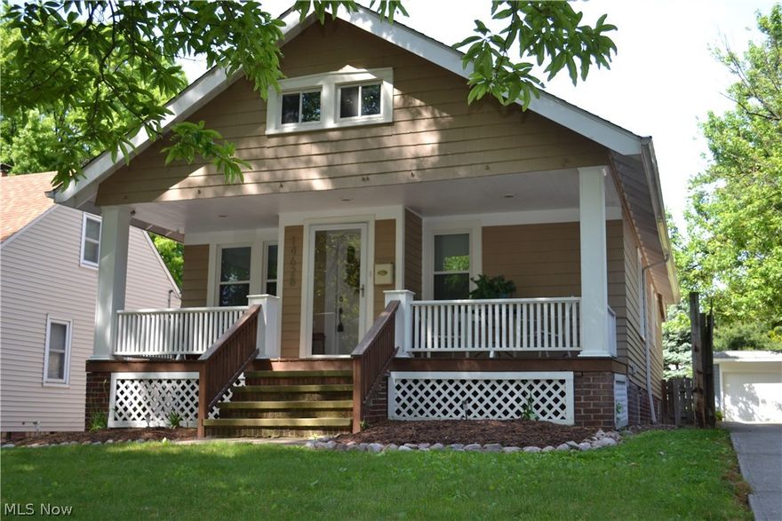 Are you ready to move in? This beautiful Cape cod home boasts more than  you can imagine! It was literally stripped down to the bare studs & Completely rebuilt including newer roof 7 years ago! It has originals hardwood floors throughout. Newer bathroom with jetted tub! Master bedroom has large double closet. 2nd bedroom has large walk-in closet. Full attic for extra storage or could easily be converted to 3rd bedroom. Kitchen has beautiful granite countertops, newer stainless steel appliances (2010) & soft close cabinets. Enjoy the evening sitting on the front porch or back deck overlooking a full fenced in yard. It's close to I-90 & I-71 with shopping centers, Kamm's Corner, & rapid station near by. Must see this home!