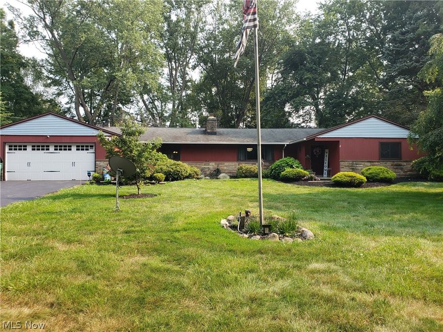 You'll love this sprawling ranch on almost a full acre of land with park views from the rear covered patio.  Huge living room with wood laminate flooring and 2 sided gas fireplace. Large family room has newer carpet and the other side of the fireplace. Nice eat in kitchen with dining area and access to covered patio. Master suite with double closets and full bath. All excellent sized bedrooms and updated main bath. 1 year home warranty paid by seller. Updates include: Kinetico K-5 drinking water system'19, Air conditioning '20, Garage door and opener '20, covered portion of patio '20, leach field '20 and all newer flooring throughout. Call your agent today, you won't want to miss out.