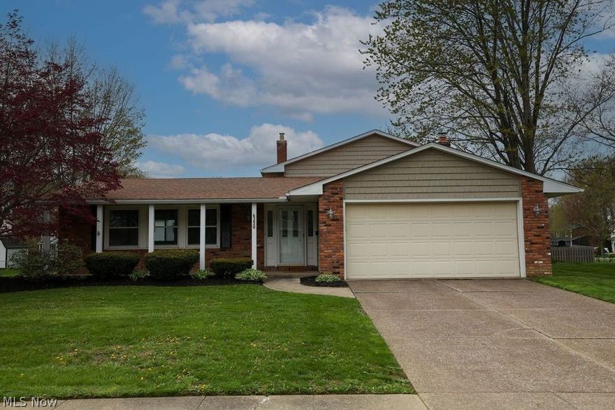 Welcome to your spacious 4 bedroom,2.5-bathroom split level in the very sought after development of Pinegate in mentor! This beautiful home is located on a quiet Cul de sac, with amazing curb appeal. Walk into your foyer with brand new lighting, and new hard wood manufactured floors! The very large living room that connects to your formal dining room has vaulted ceilings accented with beautiful wood beams, perfect for entertaining! Newly remodeled kitchen with white quartz countertops and brand-new stainless-steel appliances! The Sliding glass doors off of the kitchen lead to a three-season room with ceiling to floor windows, just in time to enjoy your summer months! The sleek, stylish lower level is complete with a beautiful bar, gas fireplace, and A fourth bedroom or office area! Thats not all! All four bedrooms have been freshly painted with a shared Renovated full bathroom! The owner's suite is complete with brand new vanity, walk in closet and its very own full bathroom! Two car attached garage. The updates continue with a new roof, newer HVAC! Large backyard with patio for entertaining and storage shed. Did I mention the community pool and endless events thrown by the HOA for you and family to enjoy! Community has walking and biking trails. Close to schools, shopping, parks and highways. This home will Not last!! Make your appointment today!!!