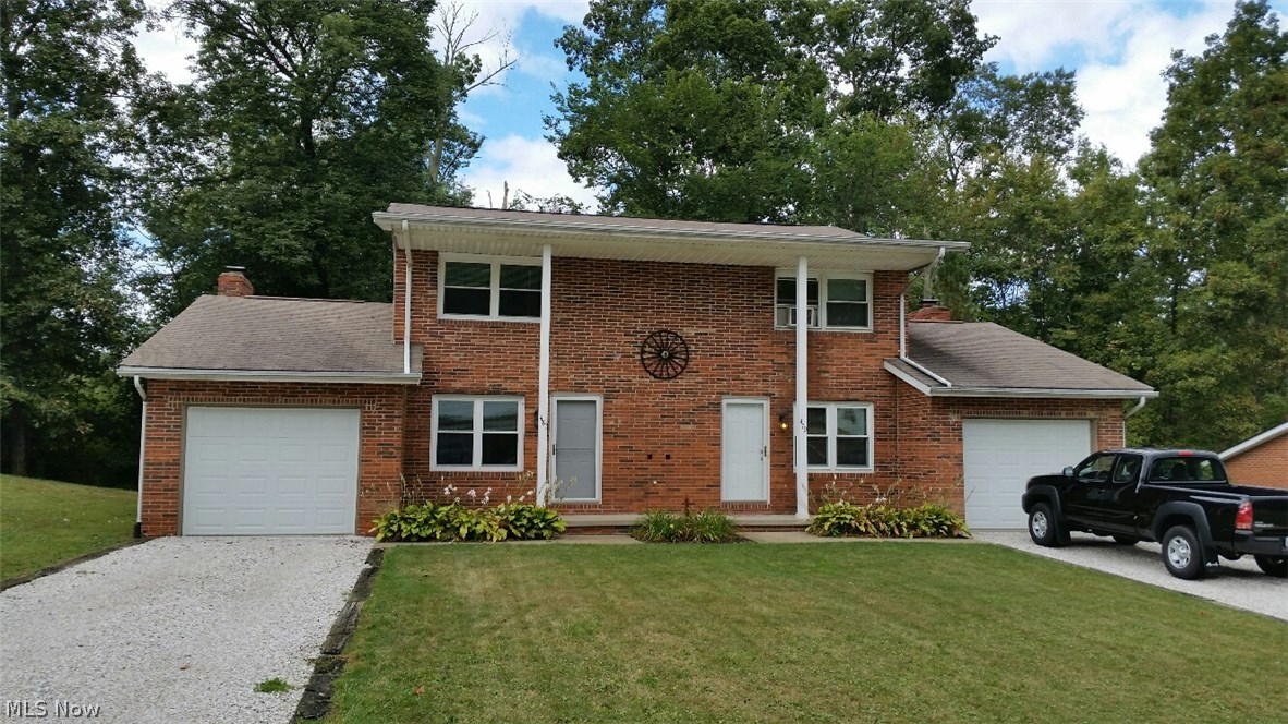 Newly remodeled in both units. New appliances, carpet, paint, flooring, doors, windows and cabinets. Once car finished garage. Front porch and 12X14 deck. Separate utilities on each side--tenant pays own utilities. 50 gal water tank. Living Room 12X15, Kit/Dinette Combo 11X28 with fireplace, Master Bedroom 12X13; 2nd bedroom 10X12, Lot size 90x150