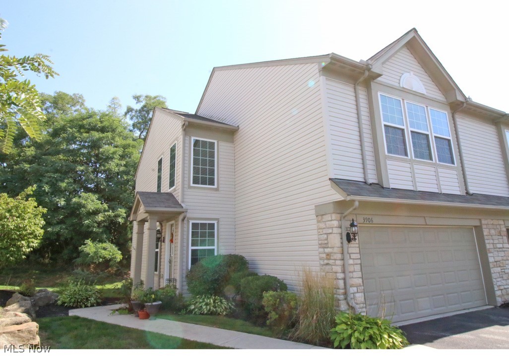 Beautiful Montrose Park Townhouse. A highly sought after end unit townhouse offers additional green space on the front entrance side. Upon entering the front door you will see the open floor plan with lots of natural light bringing the outdoors inside. The living room features a gas burning fireplace, perfect for cozy nights while enjoying a night watching TV. The kitchen opens to the dining room that has sliding doors leading to a secluded patio area that backs up to a wooded lot offering lots of privacy when relaxing. The oversized owner's suite boasts a private full bath and a large walk-in closet. Conveniently located on the second floor is the laundry room next to bedrooms. There is a 2nd floor loft area perfect for a home office. Newer carpet on main floor in fall of 2020. 2 car attached garage. If you are looking for a low maintenance lifestyle home, schedule your private showing today!