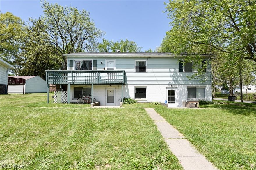 Great rental history! Good tenants! Unit A is on month to month. Unit B lease expires August 2021. Unit C lease expires July 2021. Current tenants all pay $690 monthly- unit A will be raised to $725 pending approval. All units are Section 8- rents guaranteed on time! Roof 2006, boiler furnace and vinyl siding 2007, windows 2010 with marble window seals. Tenants own appliances and wall air conditioners. Tenants pay electric. Unit C has access to private balcony. Concrete dividing walls offers sound proofing. Ample parking on nearly 1/4 acre corner lot.  Three block walk to Lakemore Recreation Park for swimming, fishing, and boat docks. Close to bus stop. Operating expenses in above amount include owner paid taxes, insurance, water, sewer, gas and trash. Great investment or live in one unit and let the tenants help pay off your property and plan for your future retirement.