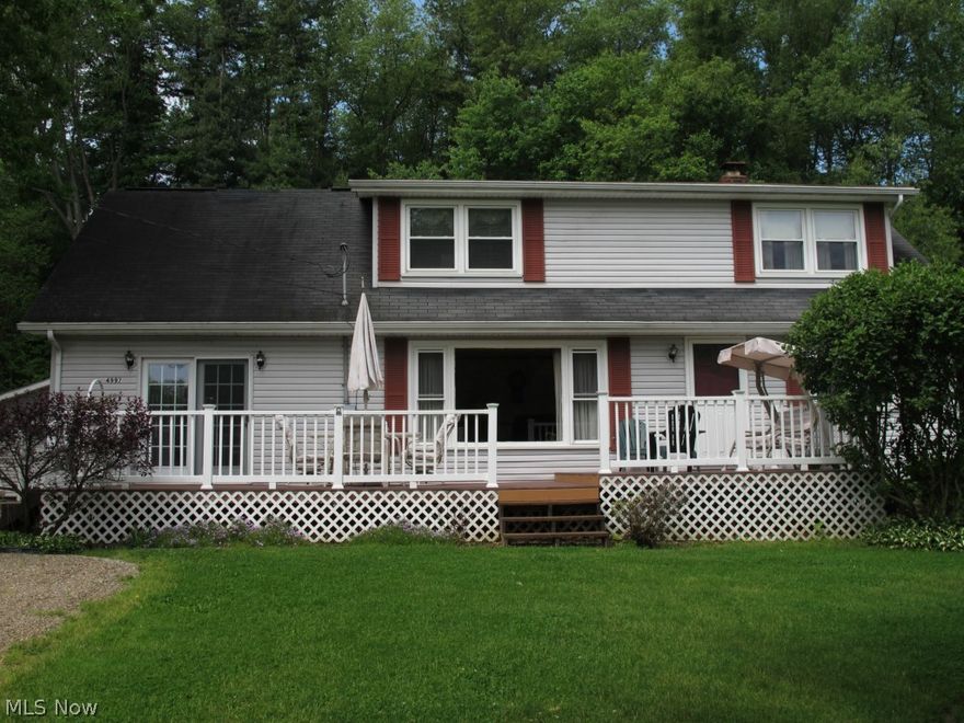 1.5 acres surround this charming home, with 3 bed rooms, 1 1/2 baths. Updated appliance kitchen, plus new windows in 2000, water heater in 2007. Lennox electric furnace and heat pump 2003, water softerner 2007. 34X12 Trex front porch with vinyl railing. Back deck is 23X12, 2 car garage is 25X32 with new door in 2007, opener 2011. Wood burners in Family room and rec room. Walkout basement, storage building. All this on very private cul-de-sac.