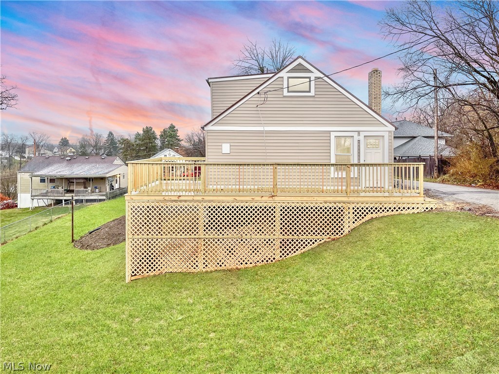 This home sits in almost a half an acre in the heart of Wintersville. Minutes Walking distance to schools, shopping, and churches.
This lot is huge, the entire home has been redone. New,siding, floors, kitchen, bath, new electric, hot water tank, new deck, floors, plumbing. The massive wrap around deck leads to the front door and kitchen perfect for morning coffees. The upstairs loft area can be easily divided into 2 bedrooms making it a 4 bedroom. The basement has plenty of room and the lot is massive with huge back flat yard! This home is cute for anyone who likes one story living- 2 bedrooms and full completely updated bath on the main floor. The kitchen has been completely remodeled. Newer Roof and Furnace.This home is TURN KEY ready in a great location! Call an agent today. Photos Virtually Staged- Seller Motivated. The owner is a licensed Real estate Agent in the state of Ohio.