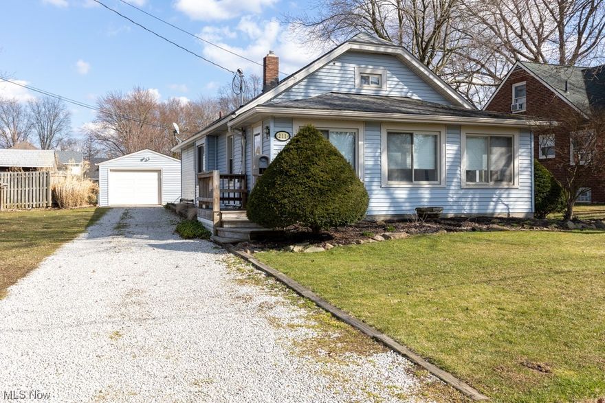 Welcome to 211 Zeta Street in Ravenna! This cozy and  well-maintained home features  1,102 sq. ft. Of living area with 2 bedrooms, 1 full bathroom, an eat-in kitchen, spacious family room, and a dining area between the family room and kitchen. Additionally, there is a 4 seasons room/ enclosed front porch with large storage closet, a full unfinished basement, fenced in rear yard with concrete patio, and a one-car detached garage all on .1722 acres. This one won't last! Schedule your appointment today!