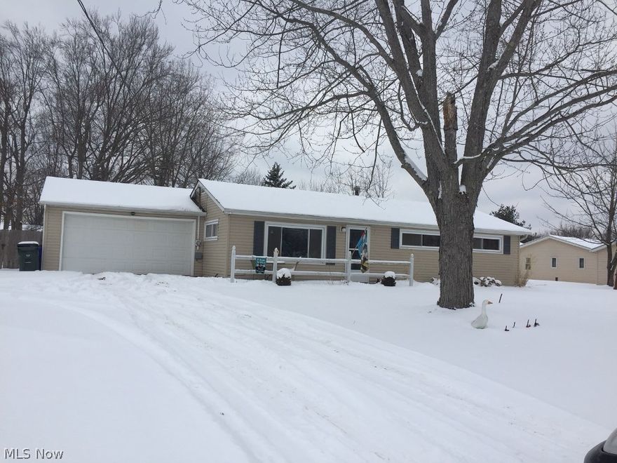 Recently remodeled ranch home.  Since 2015, new furnace, central air, hot-water tank, cherry-wood kitchen cabinets, granite counter-tops, fresh paint and new floorings throughout including new laminate in the Living Room, as well as new bathroom.  Large laundry room is plumbed to add second bath. Since 2016, a wood fence system was installed to vast back yard, including 2 gates for easy access. Walk-out to patio for privacy and enjoyment of this space. Organic garden boxes in yard and some mature trees at the rear of yard. Convenient location to schools, shopping centers, I-480, Ohio Turnpike, SR 303 and Rt. 14.  Good access to Cleveland areas, Akron or Youngstown.  Security camera system can be left, upon the sale of this home. USDA approved area!